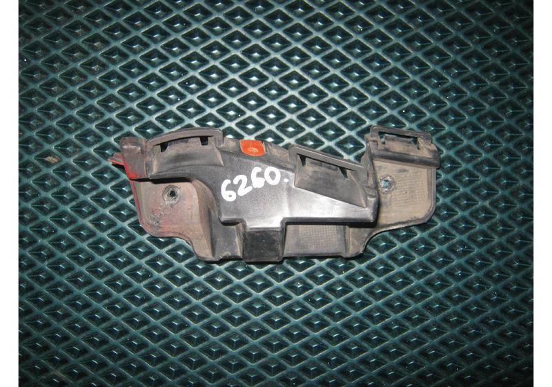 Кронштейн заднего бампера левый Opel Astra J