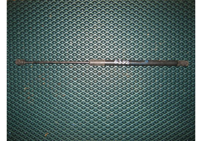 Амортизатор двери багажника Opel Astra J