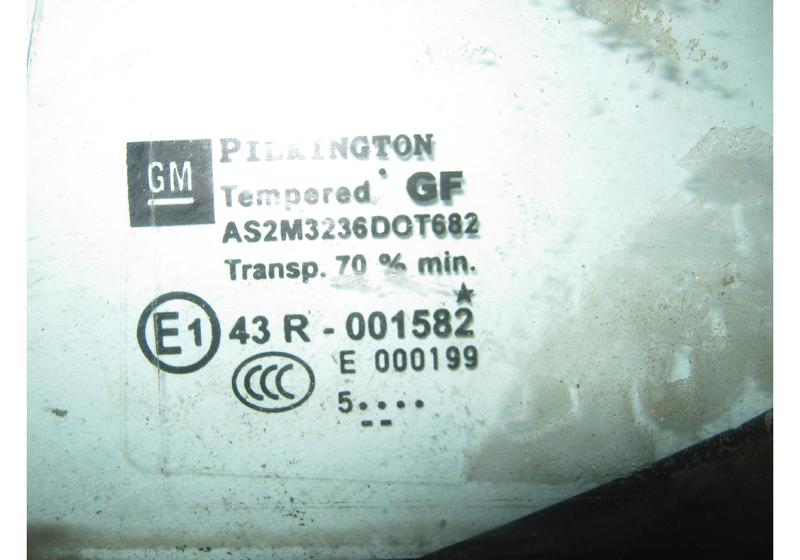 Стекло задней левой двери Opel Astra H