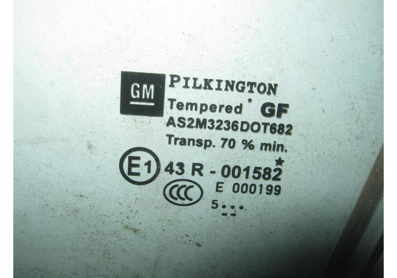 Стекло задней левой двери Opel Astra H